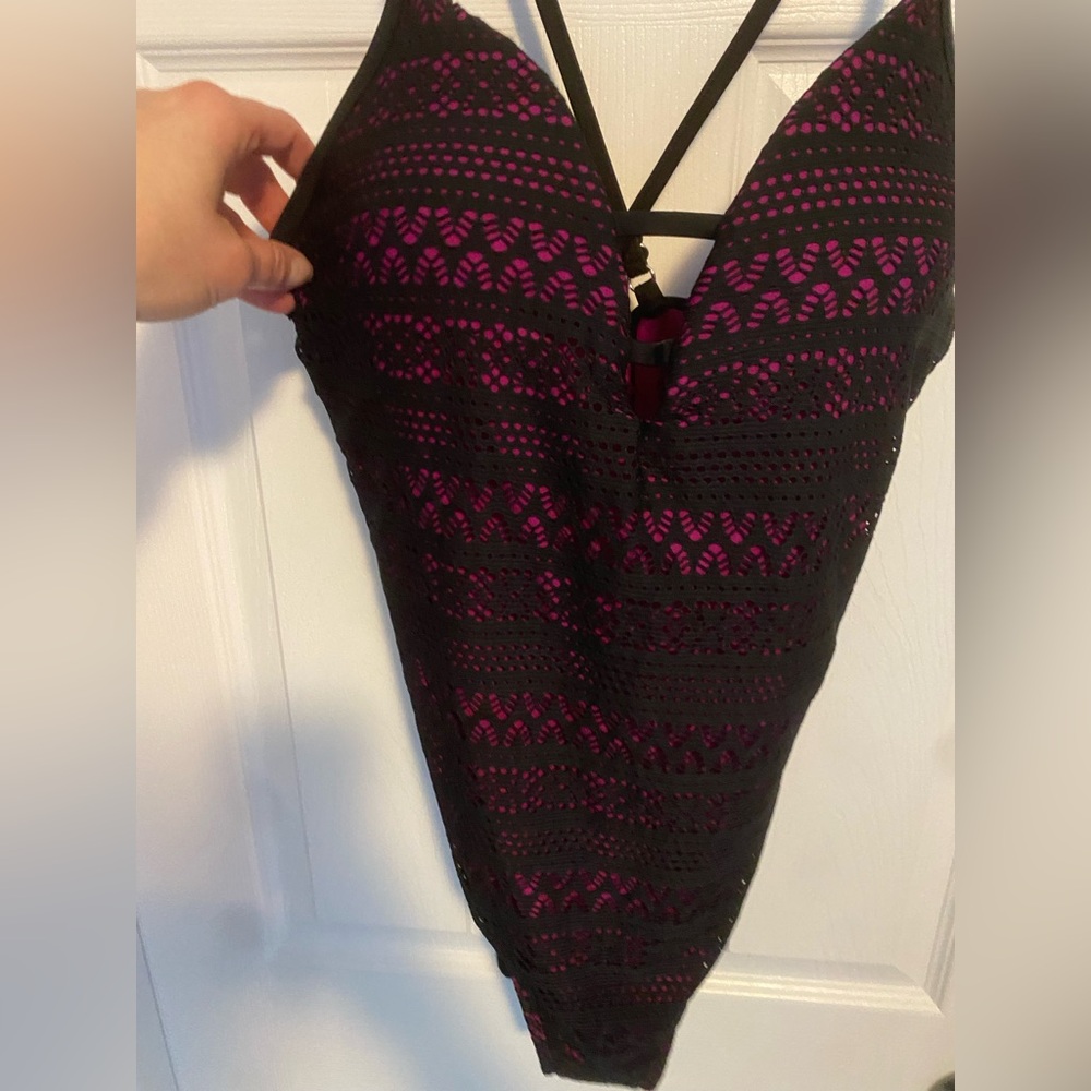 Pink and black bathing suit